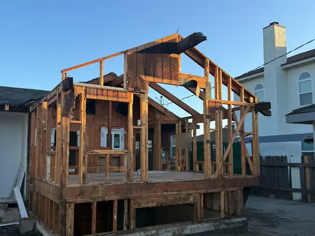 House stripped down to its wood frame