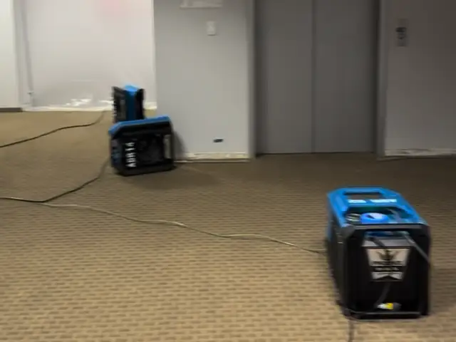 Drying equipment running on carpet in an office